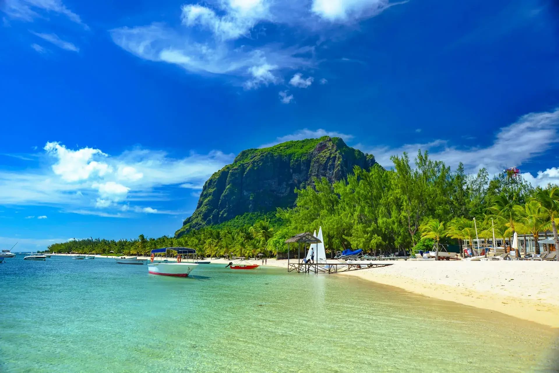 Le Morne Brabant beach Mauritius — crystal clear turquoise water, white sand and tropical palms